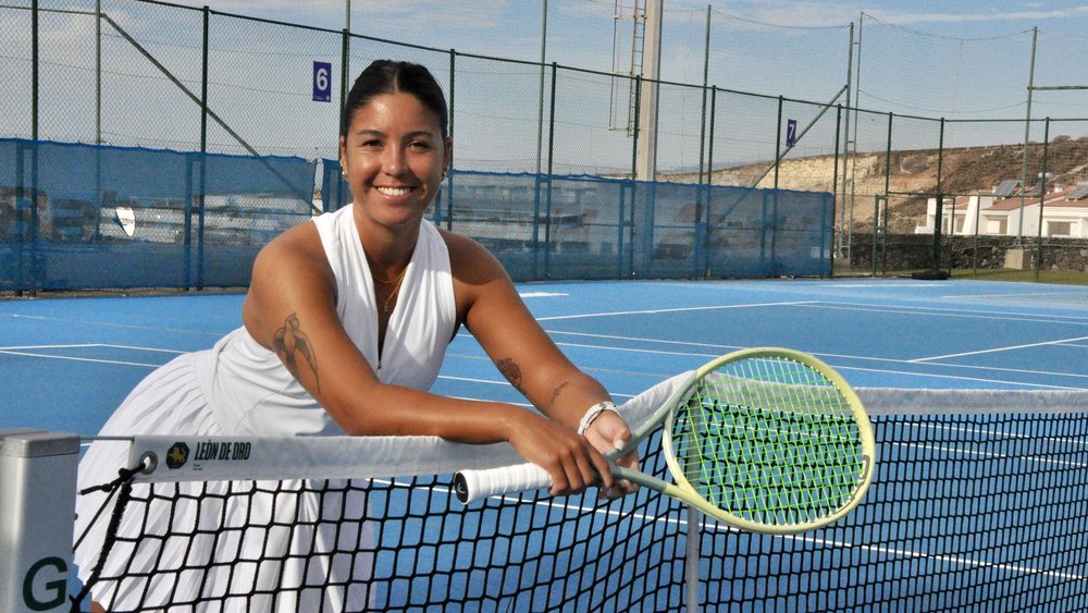 Camila at the net on the hard courts at T3