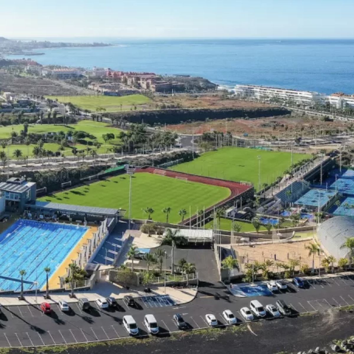 The T3 campus at La Caleta from the air, with the fifty metre pool, the athletics track and the tennis courts