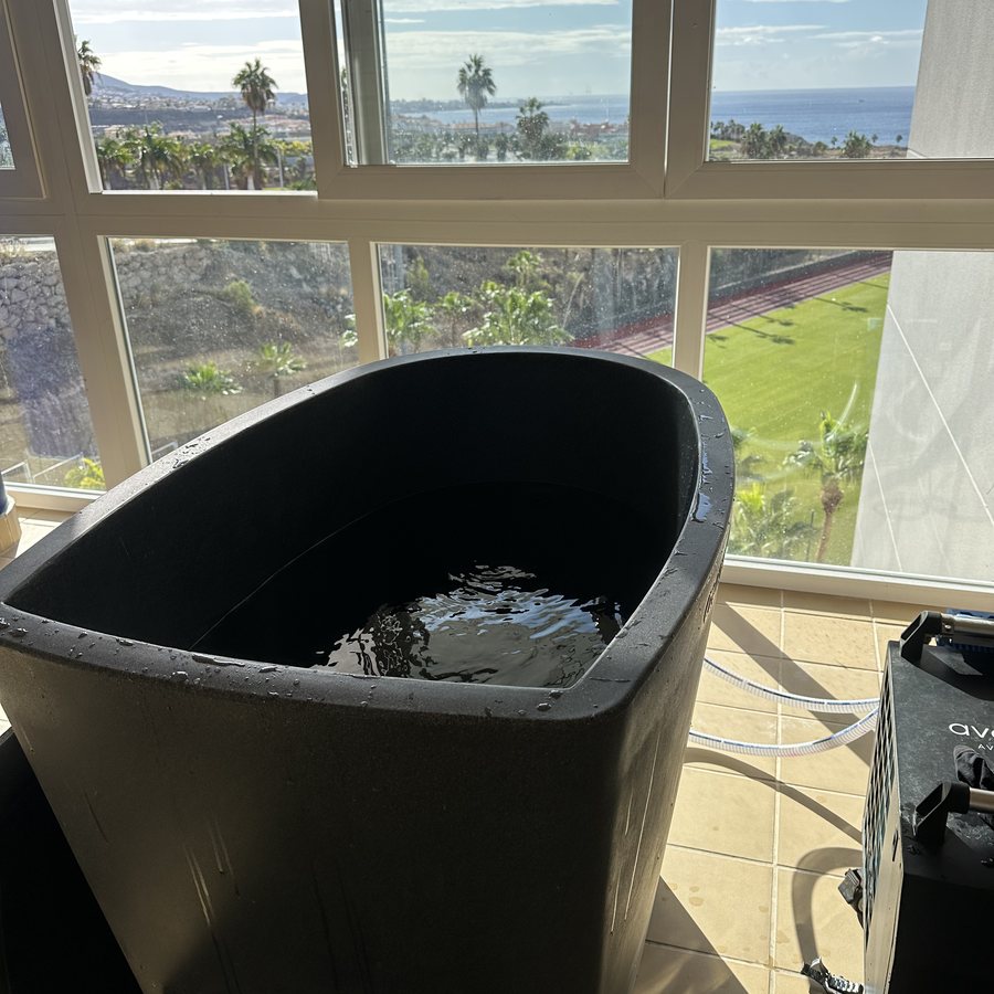 The ice bath at T3, looking out over the courts and the sea