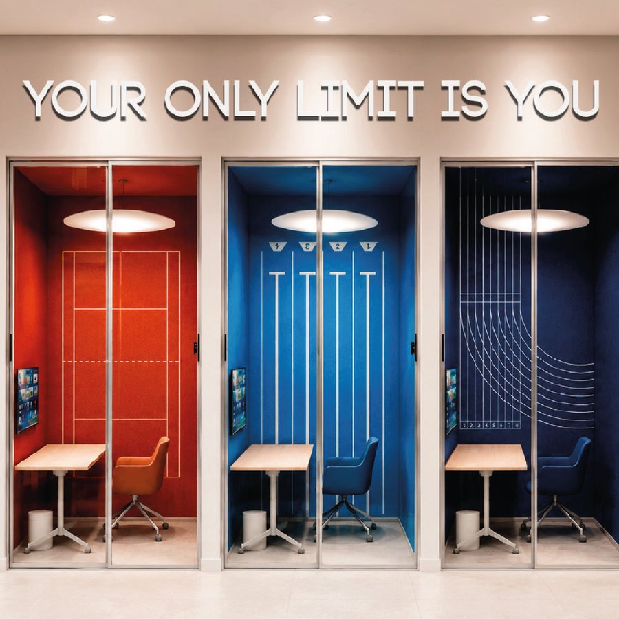 Individual study pods with desks, screens and chairs